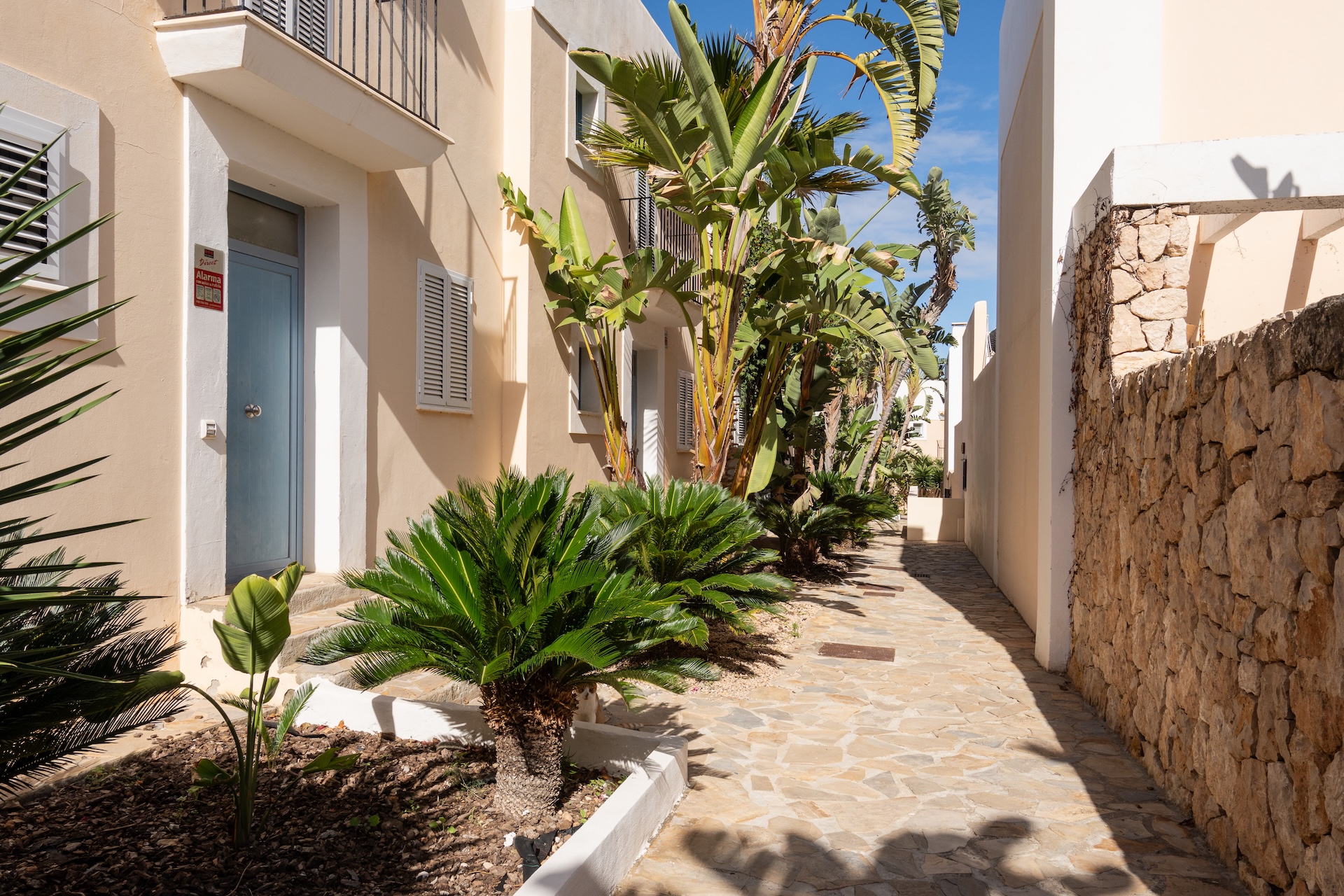 Resa Estates Ibiza sale ted koop Cala Tarida patio townhouse comminuty 3.JPG